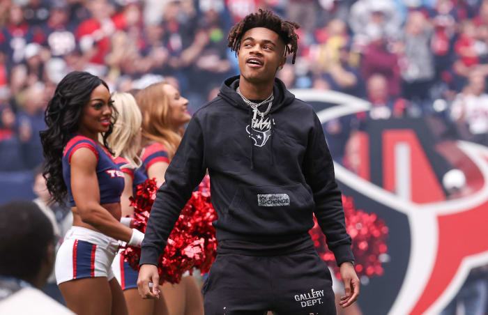 Texans wide receiver Tank Dell on the field before the game against the Tennessee Titans at NRG Stadium.